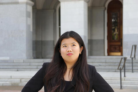 candidate (Kylie) looking up with slight grin